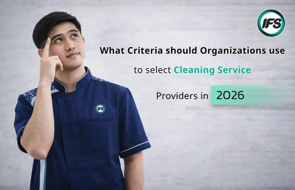 พนักงานกำลังคิดพร้อมข้อความเกี่ยวกับเกณฑ์ในการเลือกผู้ให้บริการทำความสะอาดสำหรับองค์กรในปี 2026 - บทความดี ๆ จากกลุ่มบริษัท ไอเอฟเอส ฟาซิลิตี้ เซอร์วิสเซส จำกัด ผู้ให้บริการดูแลอาคารครบวงจรชั้นนำประดับประเทศ